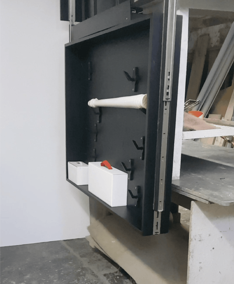 sistema descensor para estanterías