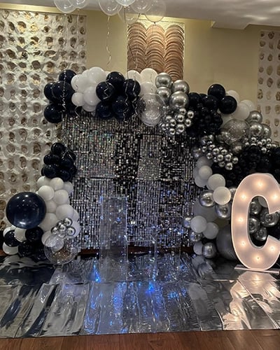 a large number of balloons and balloons in a room