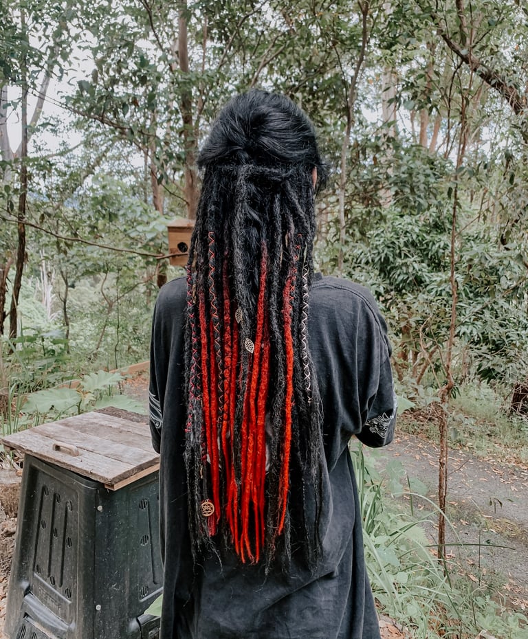 a woman with synthetic dreadlock extensions