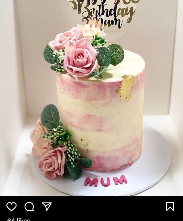 a pink watercolour cake with roses