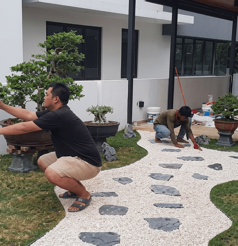 Bonsai garden installation at Laman Granview Selangor featuring potted trees and white gravel path.