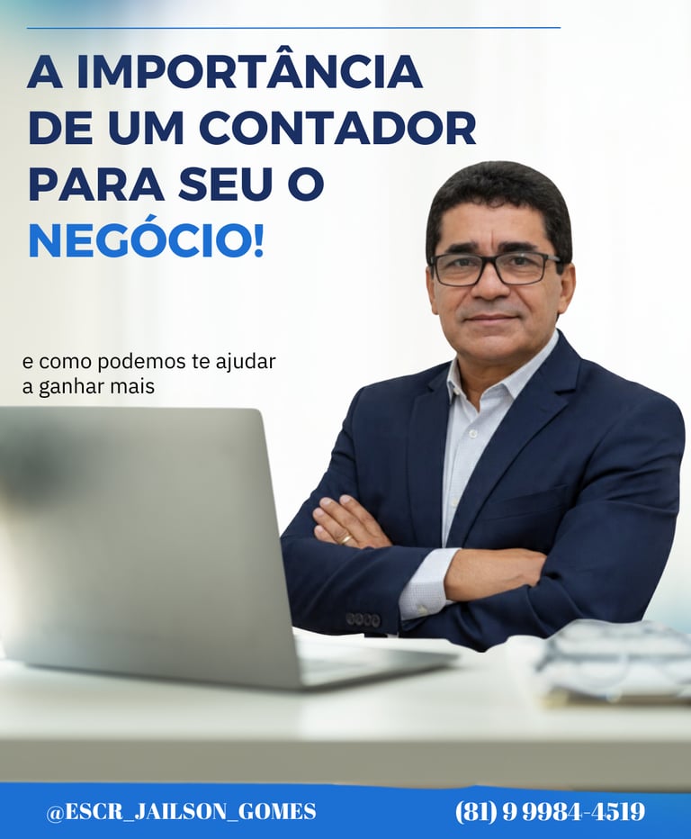 a man in a suit and glasses sitting at a desk