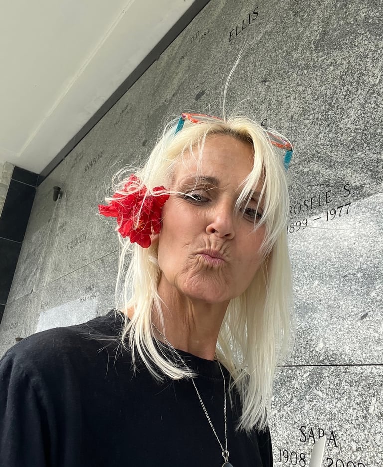 Shannon Falk at the grave of Gertrude Falk