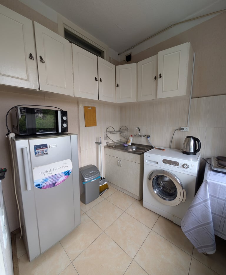 the kitchen of Cozy apartment with Balcony in Tbilisi Georgia 