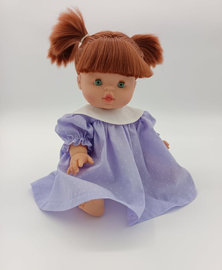 Minikane doll in round collar dress