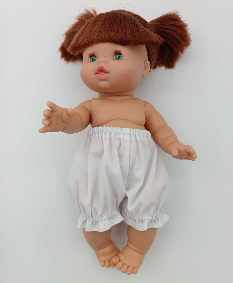 Minikane doll wearing handmade bloomers