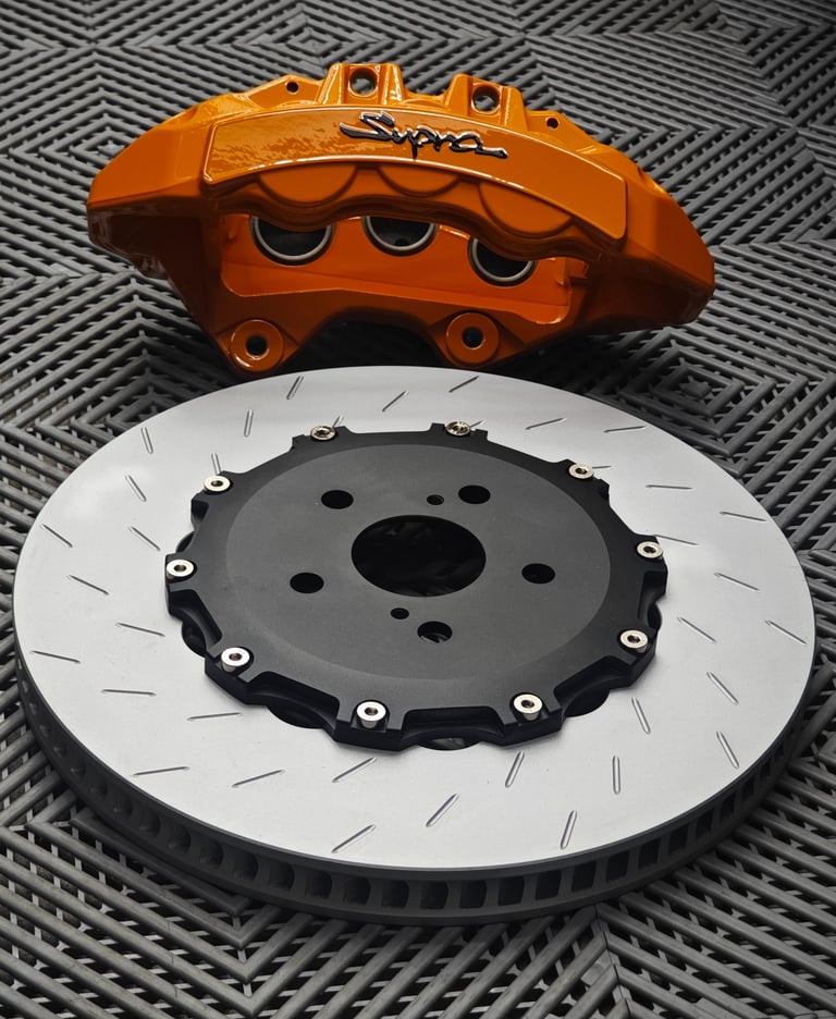 Lexus F caliper retrofit for a MKIV Supra using 380x34mm PFC slotted 2-piece rotors