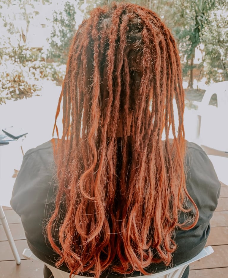 a woman with dreadlocks