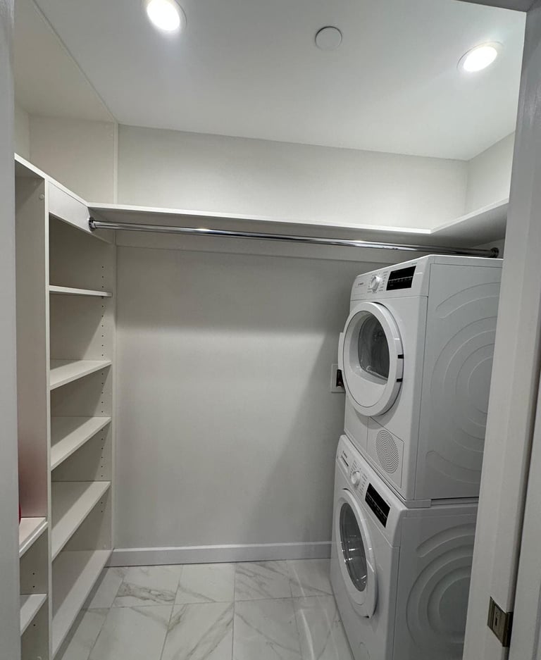 a laundry room with a washer and dryer