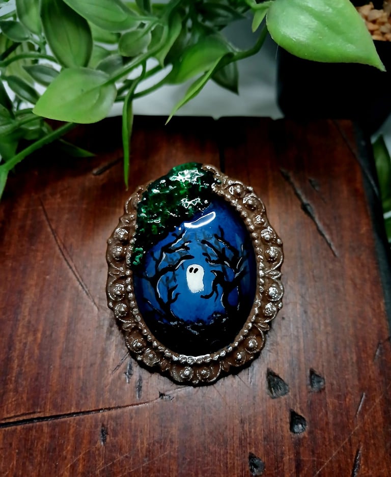 Handmade miniature ghost painting in a vintage frame with spooky trees and green moss.