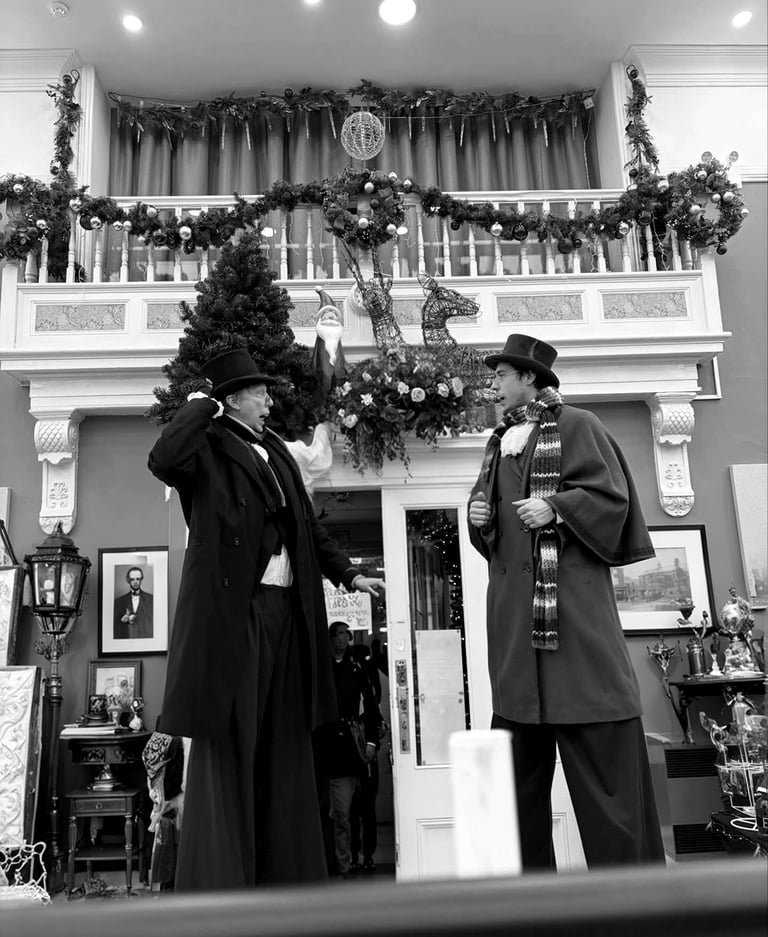 Performers in Victorian / Edwardian costumes and top hats  Christmas .Entertainment