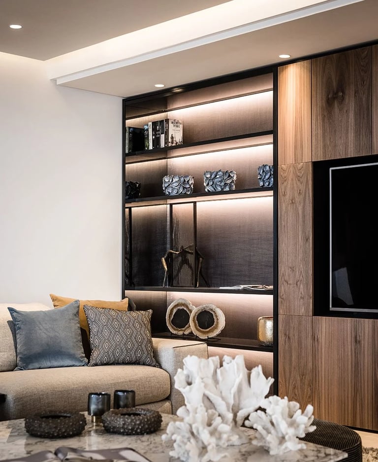 Living room detail with custom wood shelving and integrated TV wall