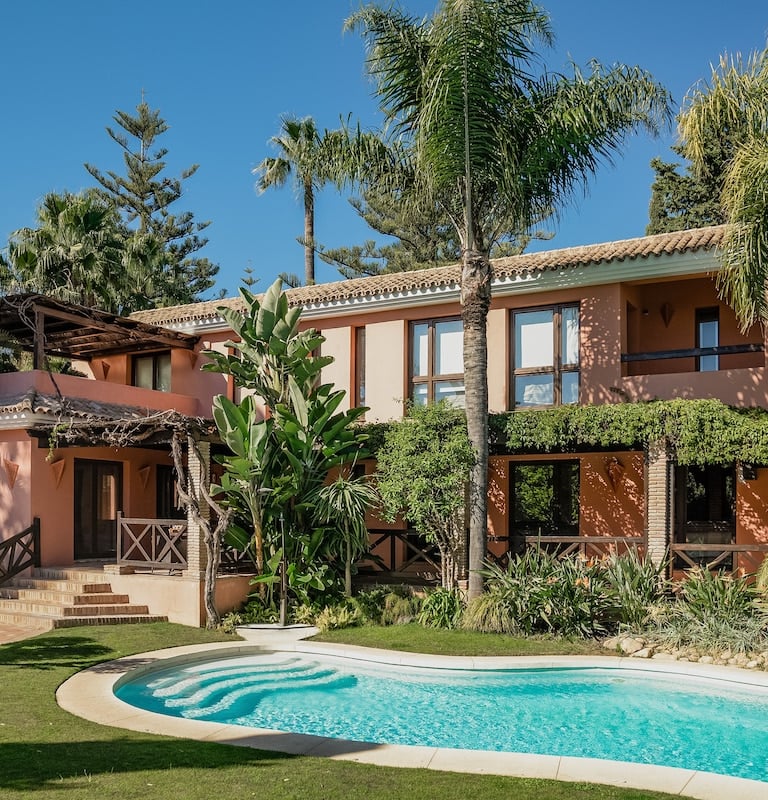 Exterior view of the two-villa estate with landscaped gardens on Marbella's Golden Mile