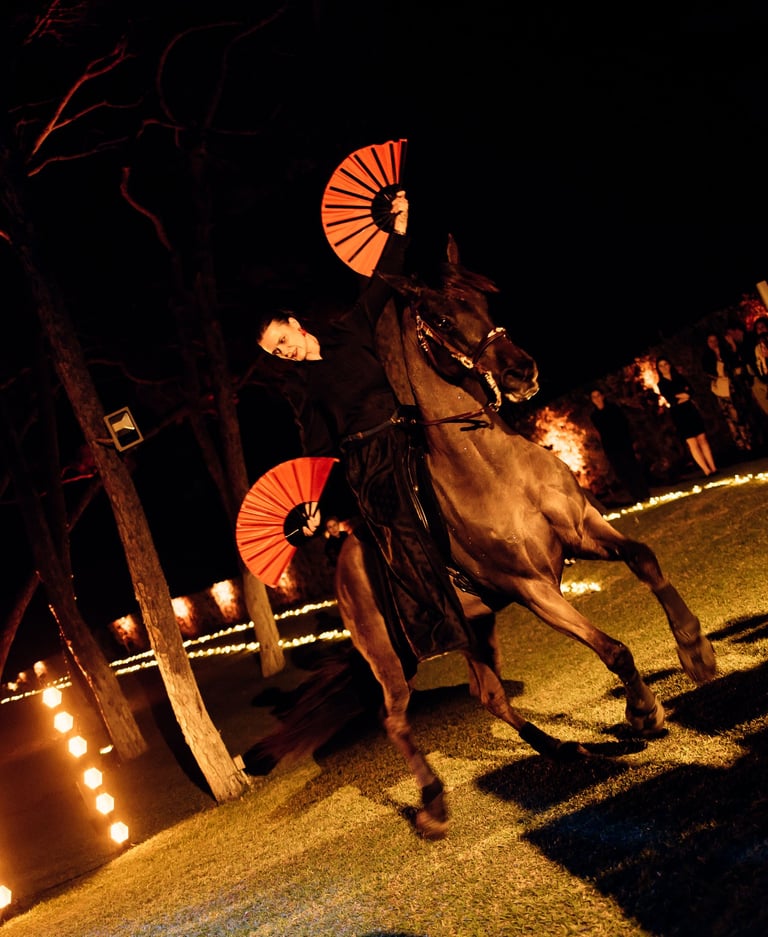 Corporate event at Villa El Rincon in Marbella featuring a live flamenco performance with horse riders.