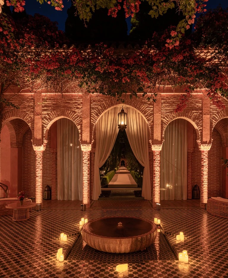 Luxury villa courtyard with Arabic architecture, ambient lighting and candle setup for private event