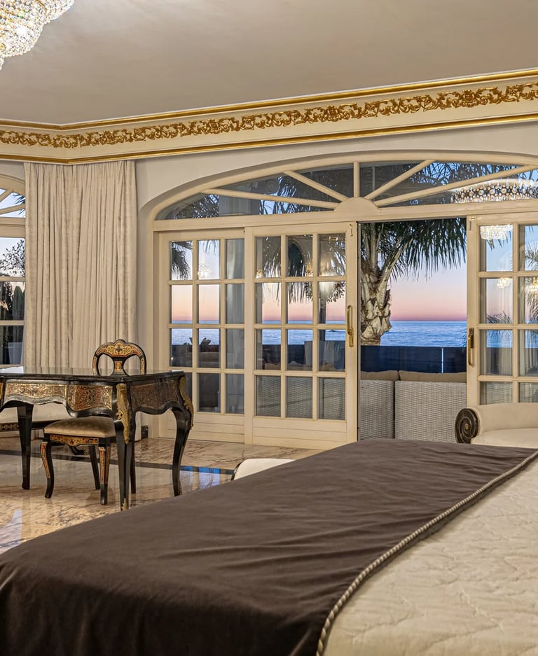 Master bedroom with terrace access in luxury coastal villa Marbella Spain