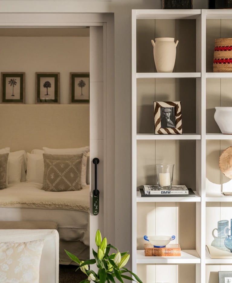 Cozy bedroom with built in shelving