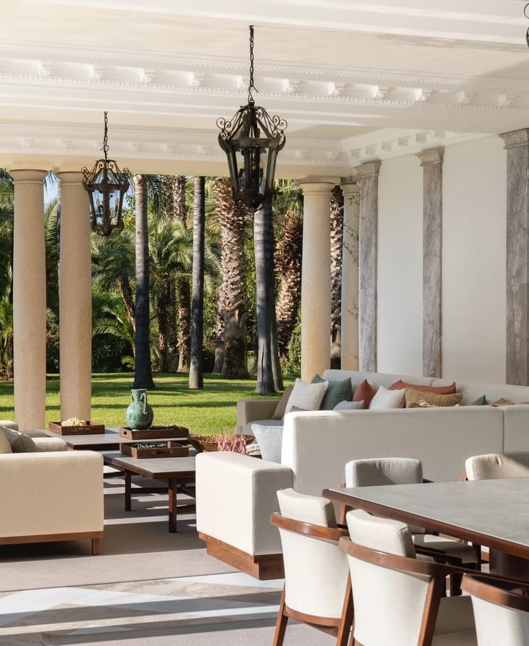 Garden-facing terrace lounge with outdoor dining area