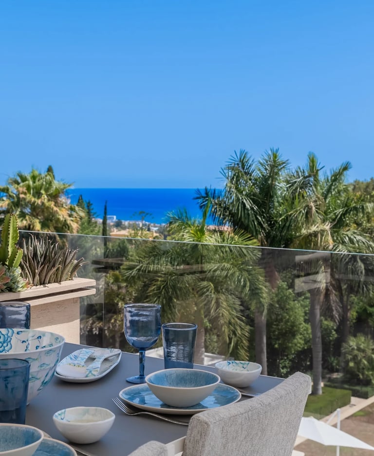 Terrace dining table with a panoramic ocean view