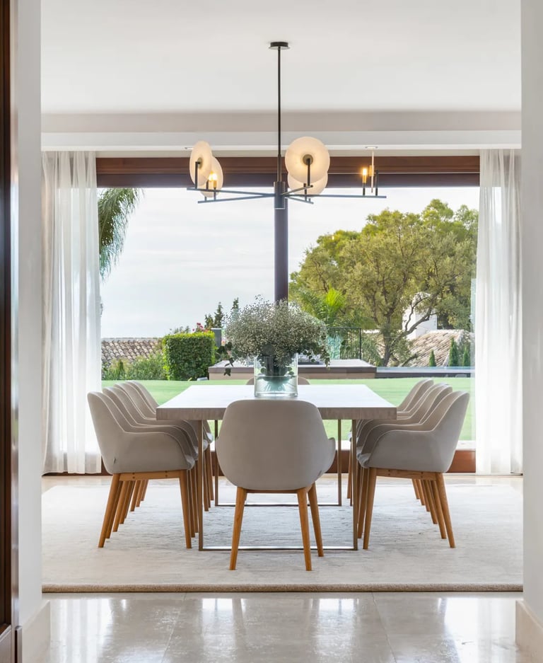 Formal dining room with garden and sea views