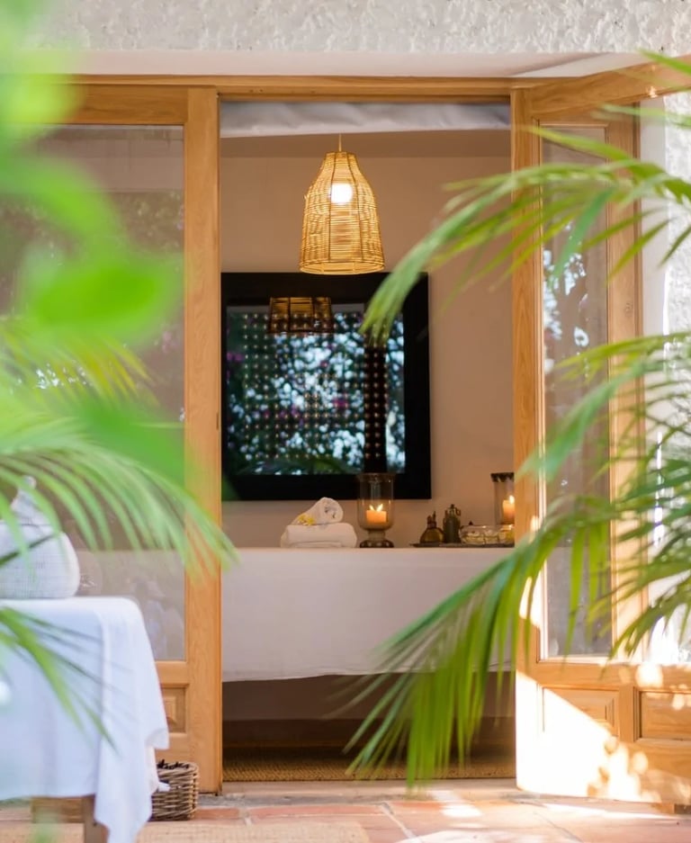 Massage room opening to private terrace