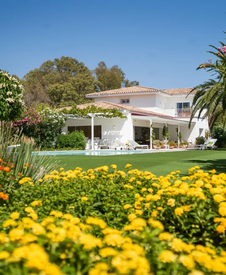 Andalusian style villa surrounded by landscaped gardens
