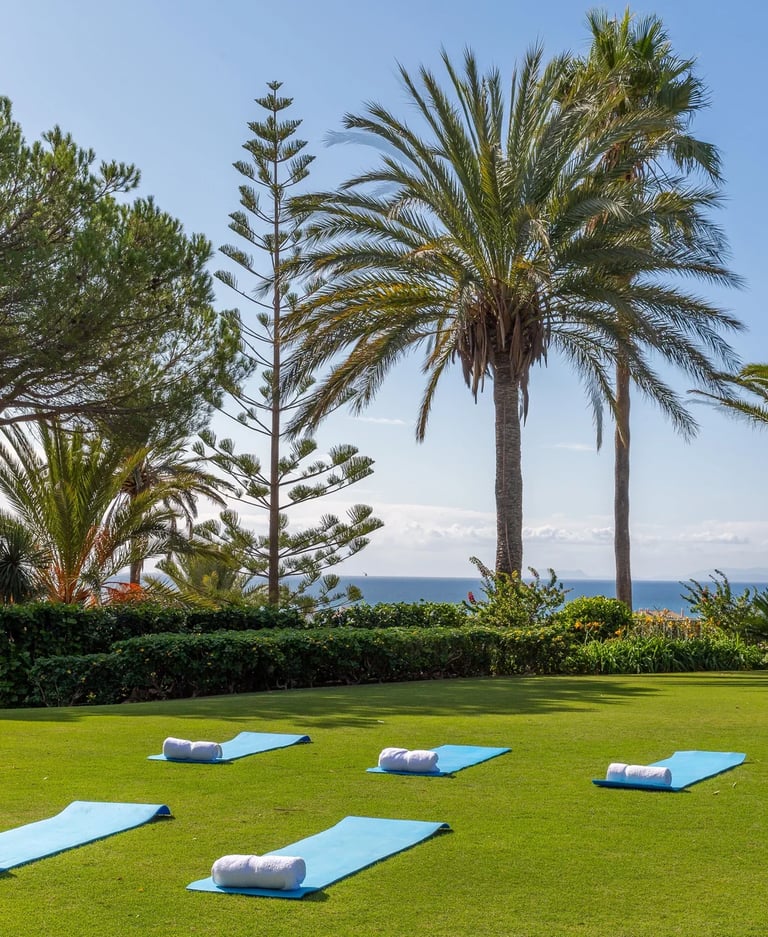 Lawn set for wellness sessions with Mediterranean views