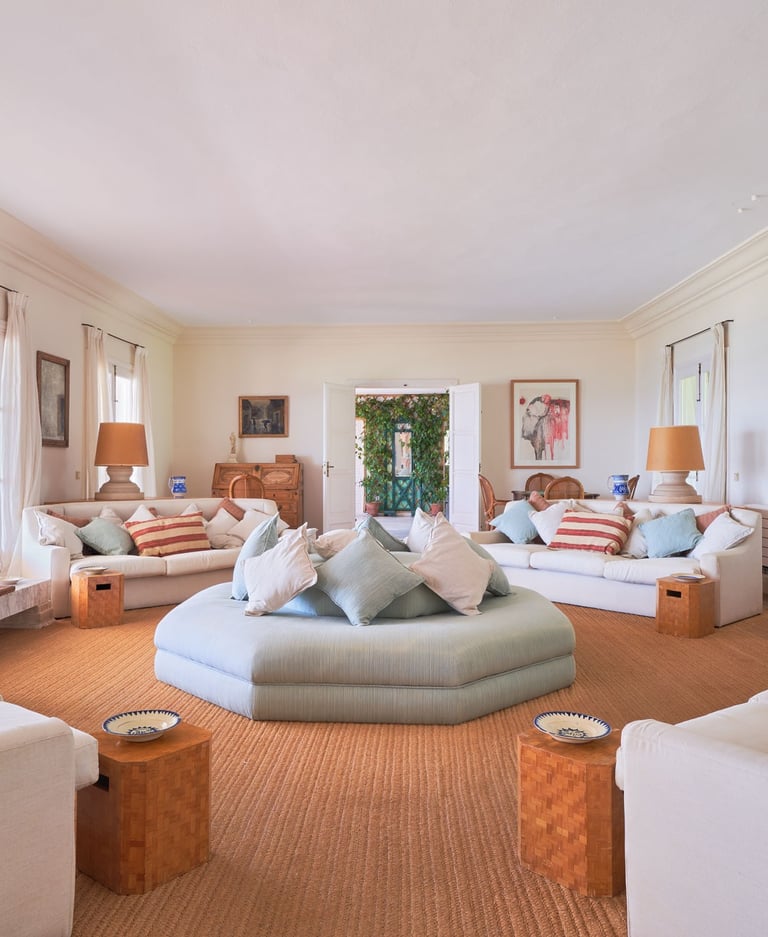 Spacious living room with fireplace and ocean views