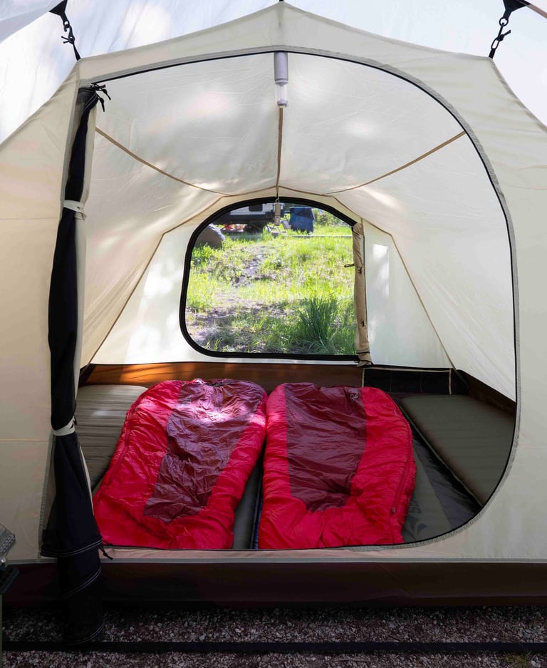 Inside Snow Peak Vault Tent With Red Sleeping Bags