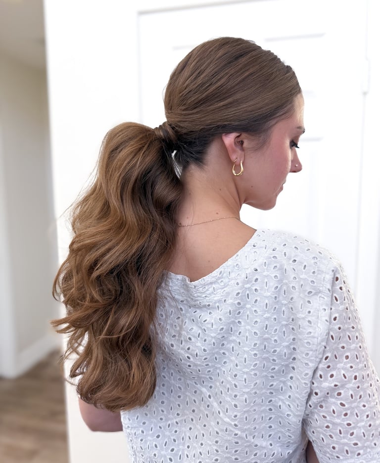 Central Valley vineyard bride with effortless, soft-textured bridal ponytail in golden sunset light