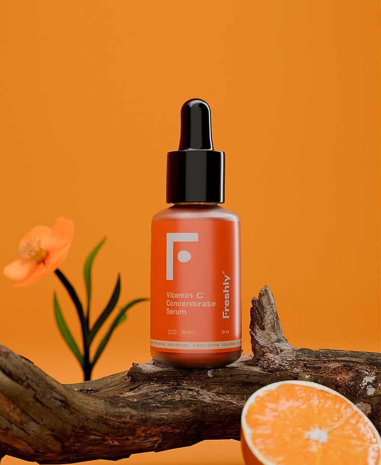 Bote de vitamina c de la marca Freshly, encima de un tronco con una flor al lado y un trozo de naranja.