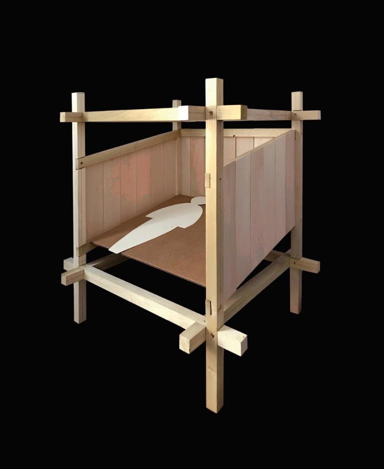 A photo of a wooden architectural model