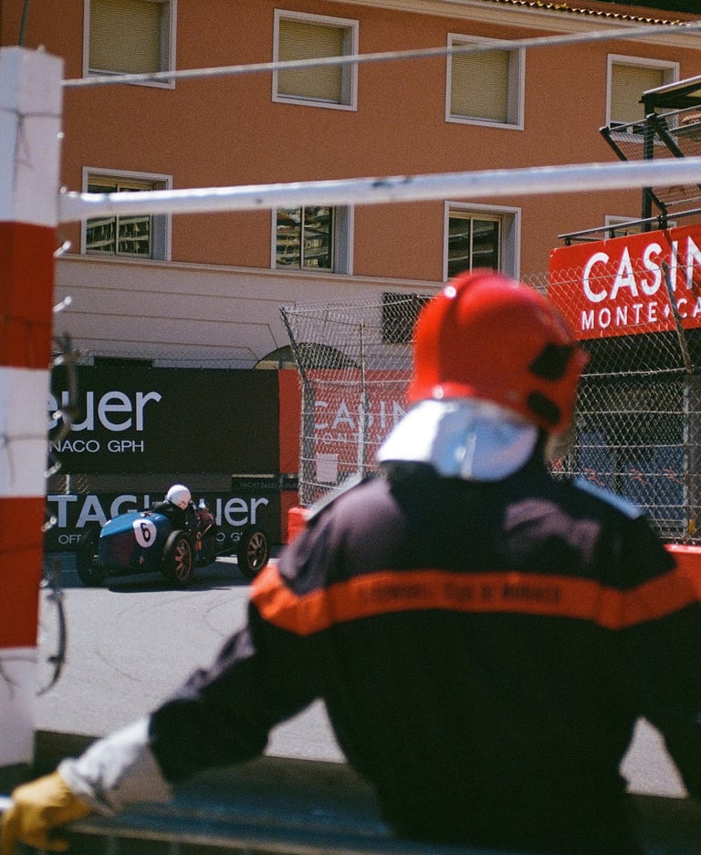 Race marshal watching pre-war Grand Prix cars race at Monaco