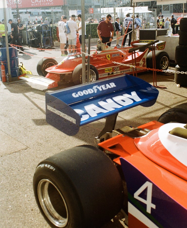 a race car parked in the paddock