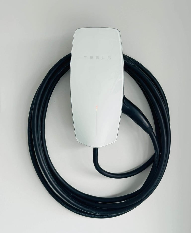 Tesla Gen 3 EV charger mounted in garage by Auckland electrician