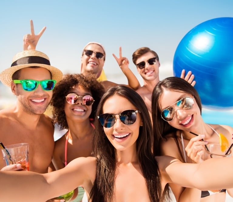 Group of friends enjoying a private Vegas dayclub tour with drinks and poolside fun