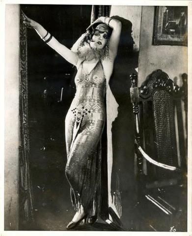 Clara bow movie photo wearing sultry Egyptian gown made of Assuit fabric, from the movie It 1927