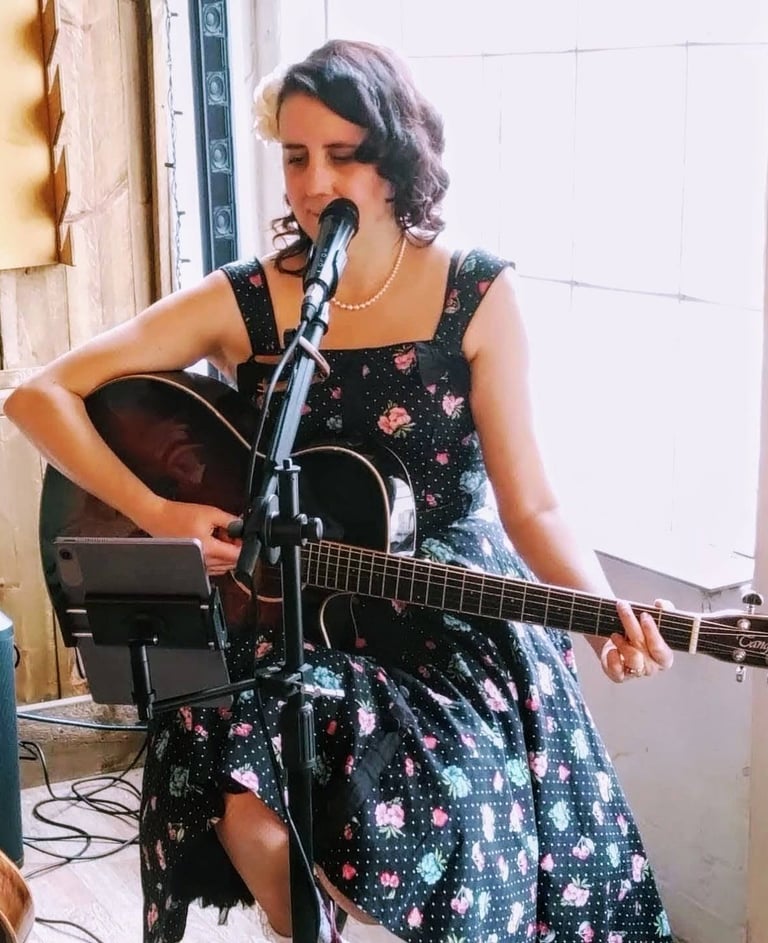 Angie Jean performing with AJ Acoustic Duo