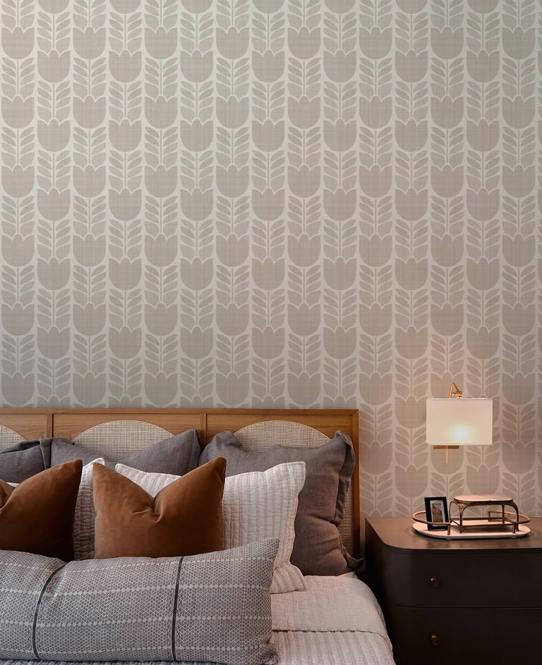 Soft beige modern geometric tulip stripe wallpaper in bedroom — The Wallpaper Edit 