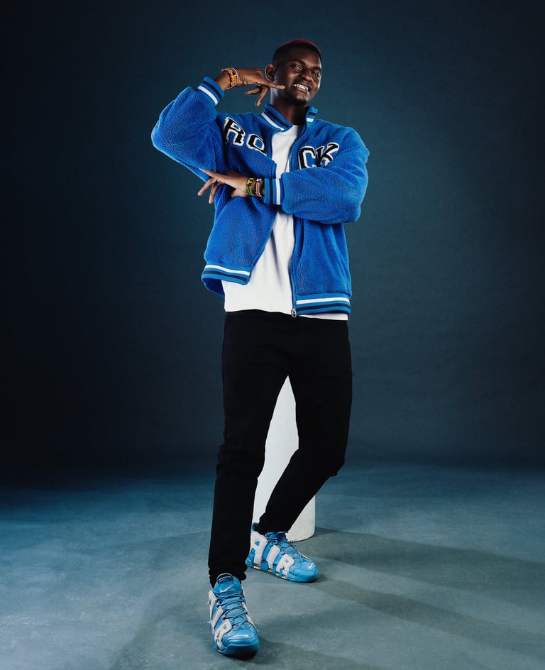 Afrofusion Beginner teacher Shawn of TheOne Studios in Nairobi, wearing blue college jacket