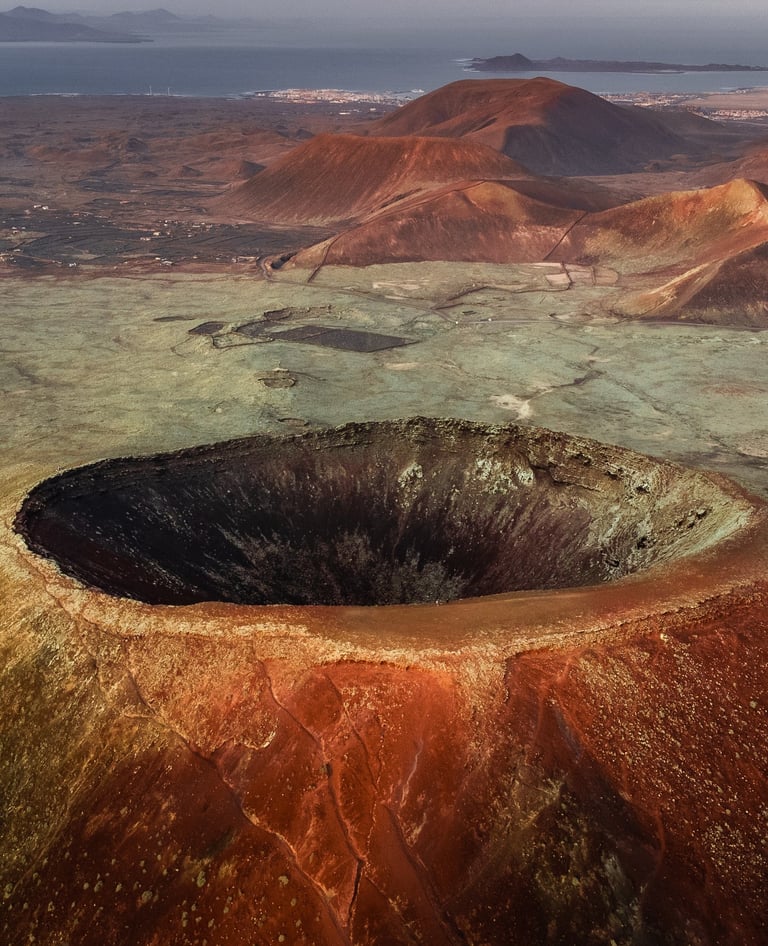 a large crater with a large crater in the middle
