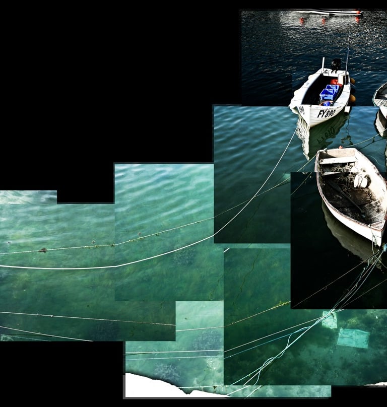A joiner image of boats tied in a Cornish harbour