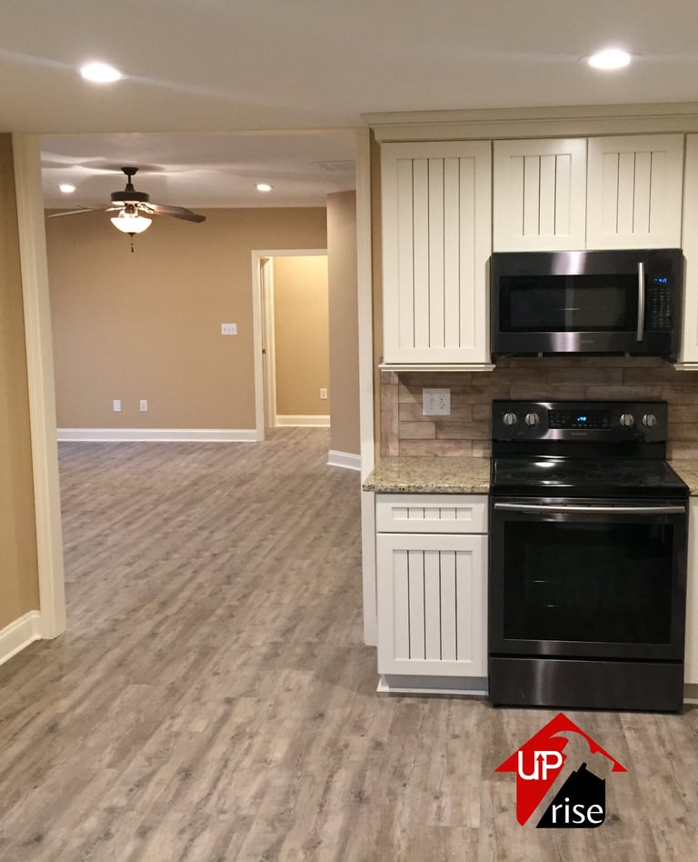 Luxury vinyl plank flooring installation in Charlotte NC by Uprise Renovation