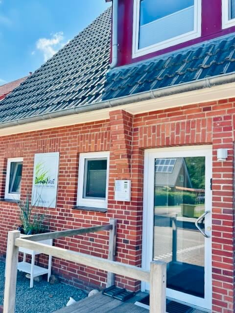 Hotel DunenNest - Ansicht vom Eingang und Schlüsselkasten, links neben der Tür