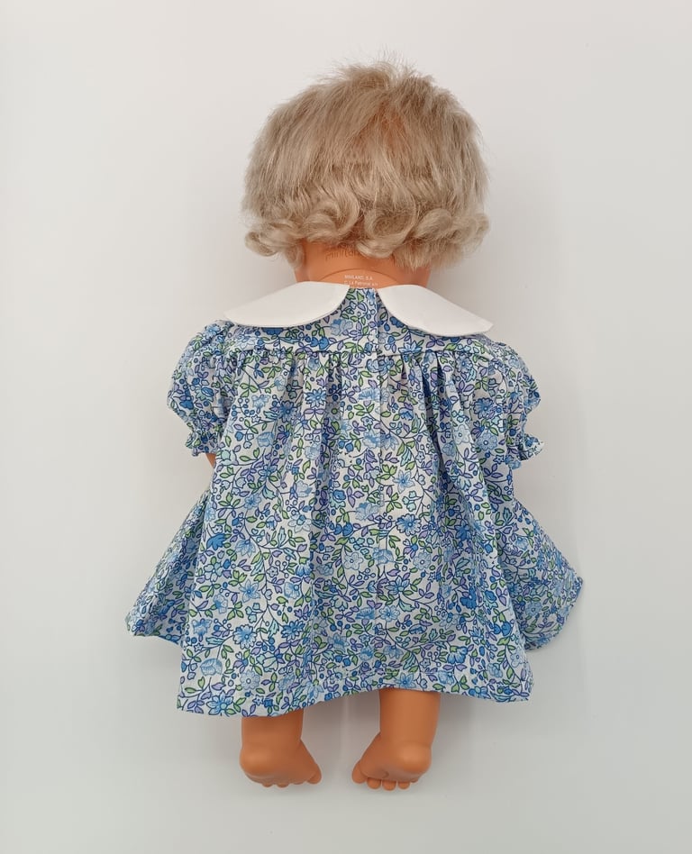 Back view of blue floral dress