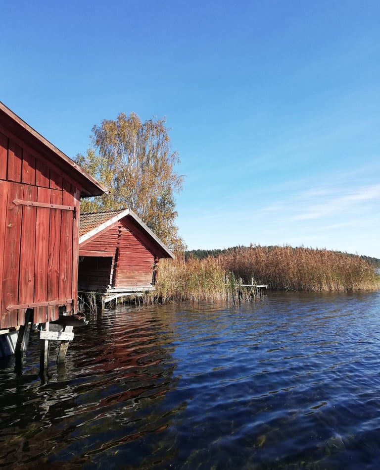 a red house by the water for pike fishing in sweden with fishing escape sweden.