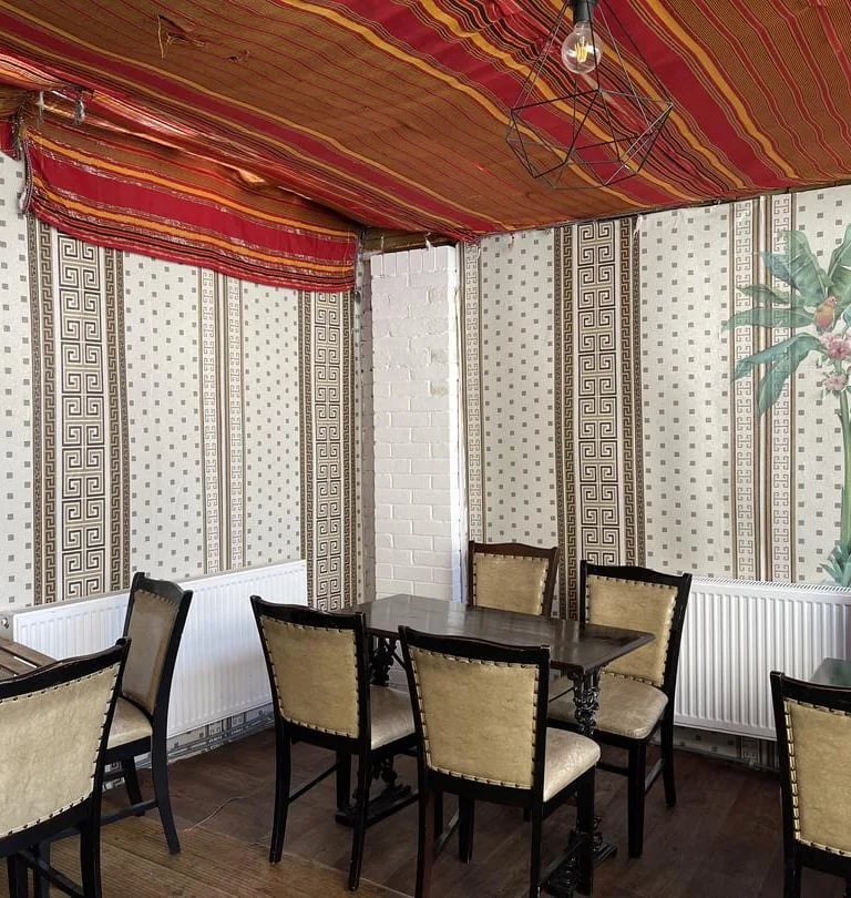 Interior dining area of Paradise Somali Restaurant in Kentish Town London