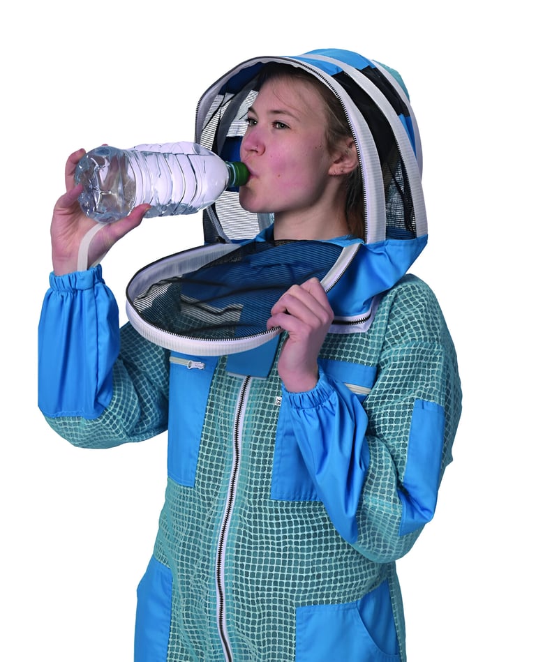 a woman in a bee suit drinking water from a bottle