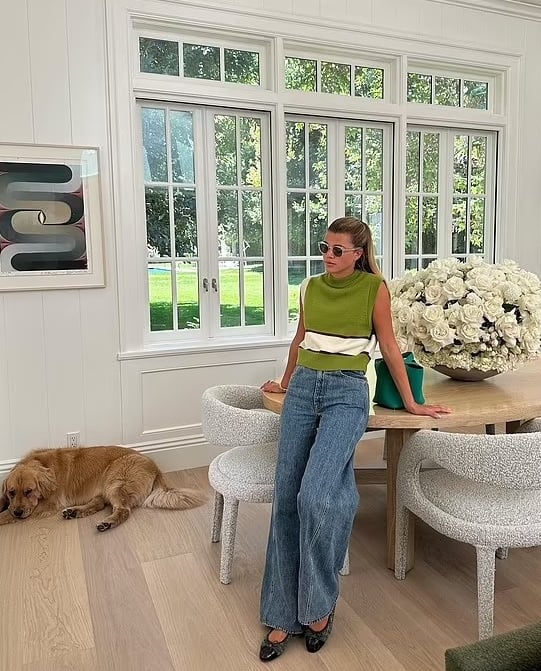 Sofia Richie posing in casual outfit inside her private home.