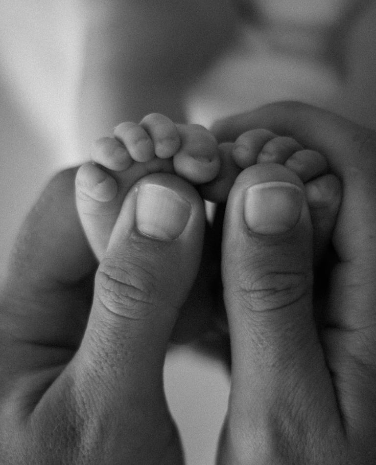 newborn toes in dads hands - natural newborn photography adelaide hills